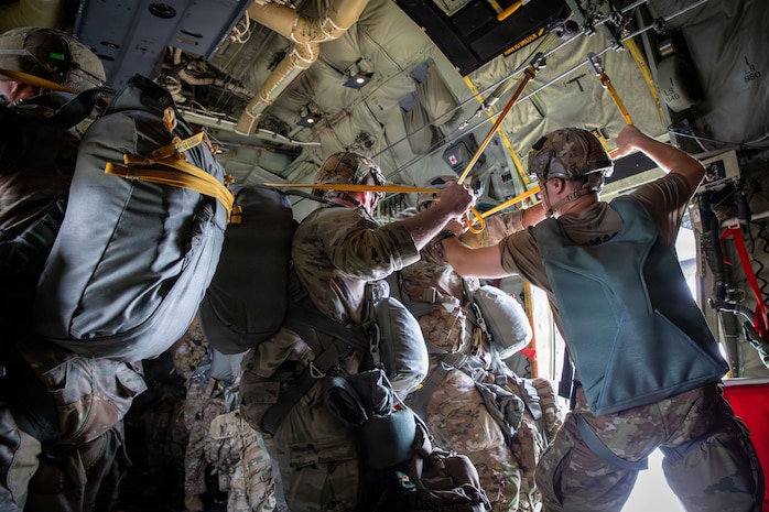 U.S. Army Soldiers, assigned to 1st Battalion, 501st Parachute Infantry Regiment, 2nd Mobile Brigade Combat Team (Airborne), 11th Airborne Division, prepare for a multinational airborne jump during Super Garuda Shield 26 at Baturaja Combat Training Center, Indonesia, Sept. 4, 2026