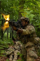 A U.S. Soldier assigned to the 173rd Mobile Brigade Combat Team (Airborne), engages simulated enemy forces during exercise Saber Junction 26 at the Hohenfels Training Area, Joint Multinational Readiness Center (JMRC), Germany, Sept. 3, 2026. 7th Army Training Command provides a unique environment in Europe to develop leaders and formations who are prepared for large-scale combat operations, improving readiness. (U.S. Army Photo by SPC. Kaleb Lampkin)