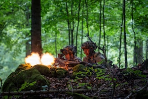 Soldiers assigned to 1st Battalion, 503rd Parachute Infantry Regiment, 173rd Mobile Brigade Combat Team (Airborne), provide suppressing fire as an assault team bounds down a hill to repel an opposing force attack during exercise Saber Junction 26 at Joint Multinational Readiness Center's Hohenfels Training Area, Germany, Sept. 3, 2026. The Continuous Transformation initiative is grounded in one principle: increasing the lethality of U.S. Army formations by creating more agile and mobile units capable of responding to complex combat scenarios. (U.S. Army photo by 1st Lt. Brandon Miles)