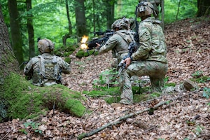 Soldiers with 1st Battalion, 503rd Parachute Infantry Regiment, 173rd Mobile Brigade Combat Team (Airborne), return fire during a battle as part of exercise Saber Junction 26 at Joint Multinational Readiness Center’s Hohenfels Training Area, Germany, Sep. 3, 2026. 7th Army Training Command provides a unique environment in Europe to develop leaders and formations prepared for large-scale combat operations while improving readiness. (U.S. Army photo by Staff Sgt. Christopher Vann)