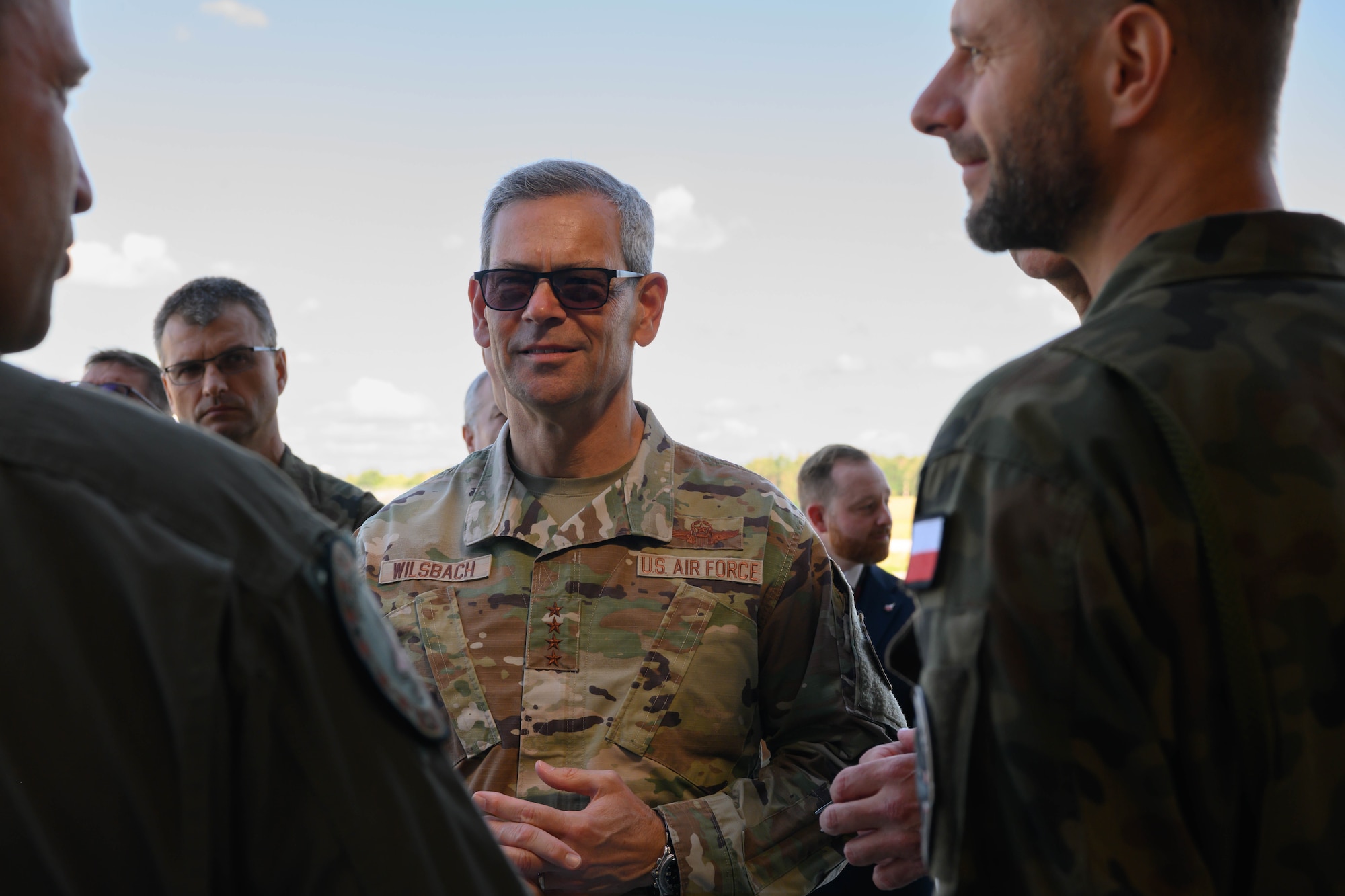 Air Force Chief of Staff Gen. Ken Wilsbach speaks with Polish service members during his visit to the 52nd Operations Group, Detachment 1.