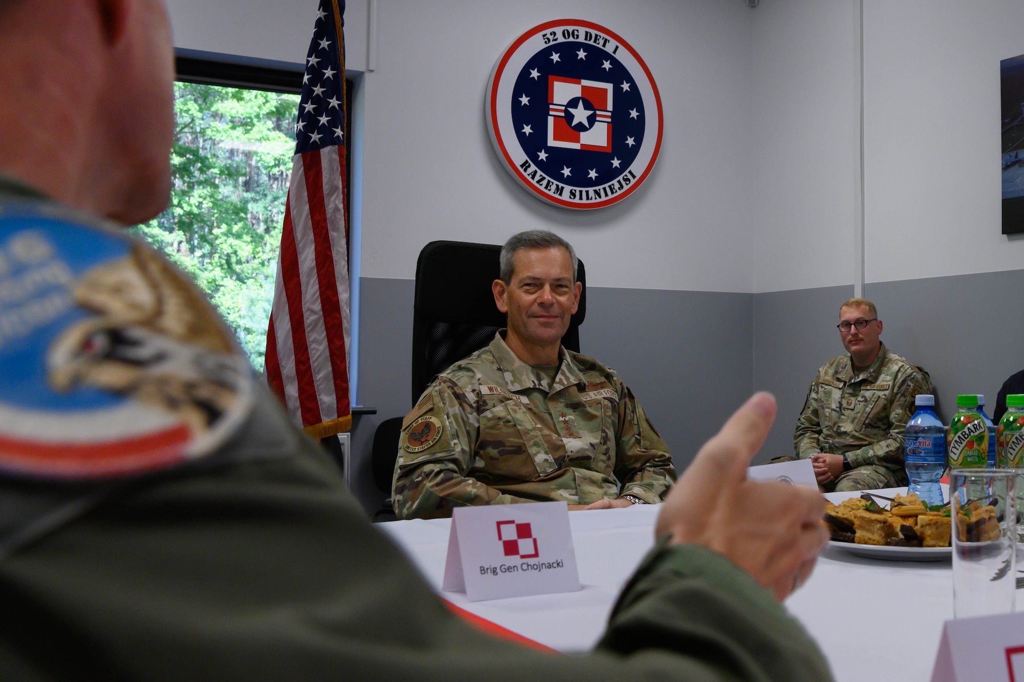 Air Force Chief of Staff Gen. Ken Wilsbach meets with Airmen and Polish service members during his visit to the 52nd Operations Group, Detachment 1.