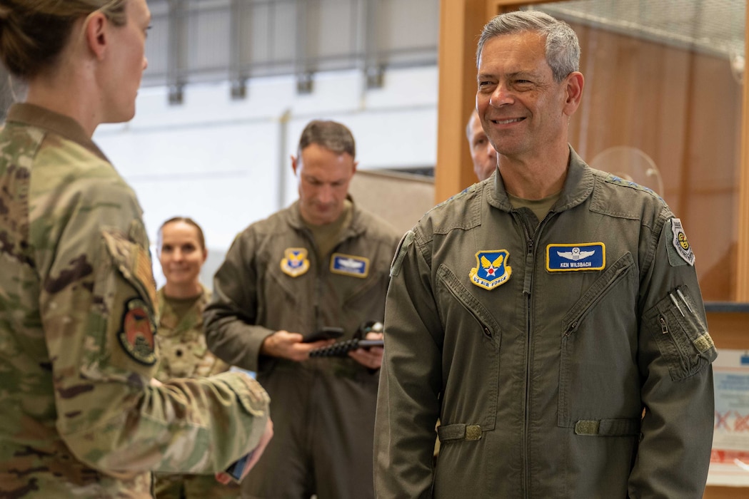 U.S. Air Force Lt. Col. Catherine Nelson, 726th Air Mobility Squadron commander, left, briefs Air Force Chief of Staff Gen. Ken Wilsbach during a mission support briefing.