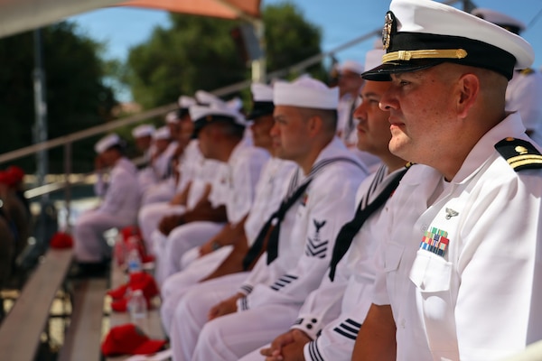 Sailors assigned to the Naval Expeditionary Medicine Warfighter Development Center (NEMWDC) observe the change of command ceremony from the stands aboard Marine Corps Base Camp Pendleton, California, Sept. 3, 2026. The command’s deckplate staff of Sailors and civilian professionals deliver the high-fidelity, reality-tested training that transforms individual health care providers into deployable Expeditionary Medicine teams. (U.S. Navy photo by Arsenio R. Cortez Jr.)