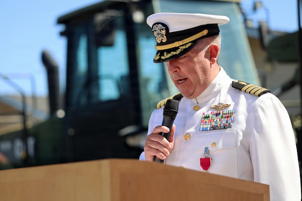 Capt. Kevin Bailey delivers his outgoing remarks during the Naval Expeditionary Medicine Warfighter Development Center change of command ceremony aboard Marine Corps Base Camp Pendleton, California, Sept. 3, 2026. During his 23-month tenure, Bailey guided the command through its establishment transition, leading operational evaluations and certifications for Expeditionary Medicine personnel. (U.S. Navy photo by Arsenio R. Cortez Jr.)