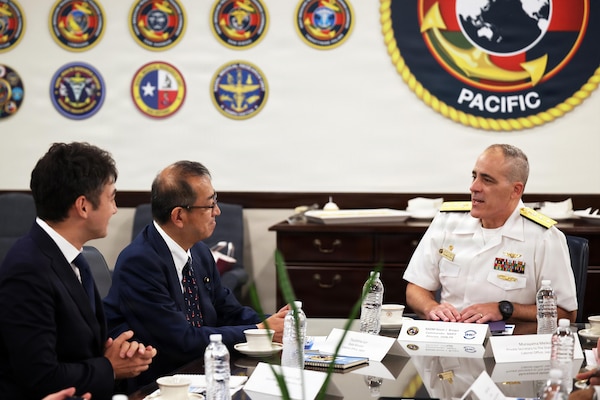 Rear Adm. Kevin Brown, commander of Naval Medical Forces Pacific and director of Defense Health Network-Pacific Rim, briefs Jun Tsushima, state minister of the Cabinet Office of Japan, and the Japanese delegation of clinical leaders and academic researchers at NMFP headquarters in San Diego, Aug. 25, 2026. Brown emphasized the command’s mission to generate a ready medical force capable of rapid deployment aboard afloat platforms like the hospital ship USNS Mercy. (U.S. Navy photo by Arsenio R. Cortez Jr.)