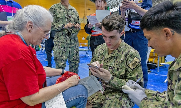 ATSUGI, Japan (Sept. 1, 2026) — U.S. Navy Sailors assigned to U.S. Navy Medicine Readiness and Training Unit (USNMRTU) Atsugi document patient information during Big Rescue Kanagawa 2026 at the Kanagawa Prefectural Comprehensive Disaster Prevention Center and Fire Academy. Big Rescue Kanagawa is a large-scale, multi-agency disaster-response exercise jointly organized by Kanagawa Prefecture and Atsugi City to rehearse patient reception, bilateral triage, and emergency response operations. (U.S. Navy photo by Daniel Taylor/USNMRTC Yokosuka Public Affairs)