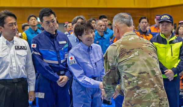 ATSUGI, Japan (Sept. 1, 2026) — U.S. Army Maj. Gen. James Dooghan, commanding general of U.S. Army Japan, greets Japanese Prime Minister Sanae Takaichi during Big Rescue Kanagawa 2026 at the Kanagawa Prefectural Comprehensive Disaster Prevention Center and Fire Academy. Big Rescue Kanagawa is a large-scale, multi-agency disaster-response exercise jointly organized by Kanagawa Prefecture and Atsugi City to rehearse patient reception, bilateral triage, and emergency response operations. (U.S. Navy photo by Daniel Taylor/USNMRTC Yokosuka Public Affairs)