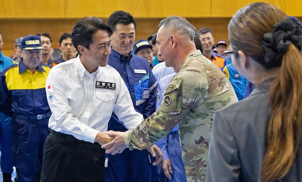 ATSUGI, Japan (Sept. 1, 2026) — U.S. Army Maj. Gen. James Dooghan, commanding general of U.S. Army Japan, greets Defense Minister Shinjiro Koizumi during Big Rescue Kanagawa 2026 at the Kanagawa Prefectural Comprehensive Disaster Prevention Center and Fire Academy. Big Rescue Kanagawa is a large-scale, multi-agency disaster-response exercise jointly organized by Kanagawa Prefecture and Atsugi City to rehearse patient reception, bilateral triage, and emergency response operations. (U.S. Navy photo by Daniel Taylor/USNMRTC Yokosuka Public Affairs)