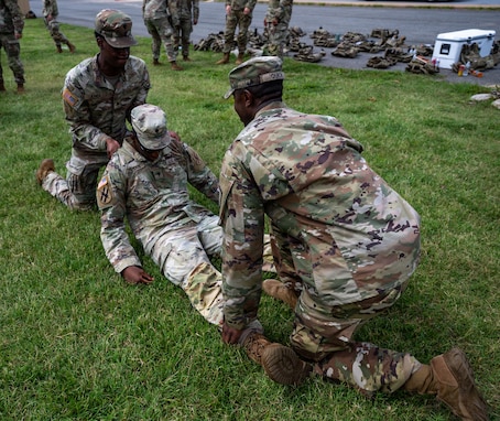 U.S. National Guardsmen with the Georgia National Guard, assigned to Joint Task Force-District of Columbia (JTF-DC) in support of the DC Safe and Beautiful mission, participate in Casualty Evacuation (CASEVAC) handling and transport training at the Logistics Staging Area on Joint Base Anacostia-Bolling in Washington, Sept. 3, 2026. Over 3,500 National Guard members are supporting the mission, providing critical assistance to the Metropolitan Police Department to help ensure the safety of residents, commuters, and visitors throughout the District. (U.S. Army National Guard photo by Sgt. Alex Lopez)