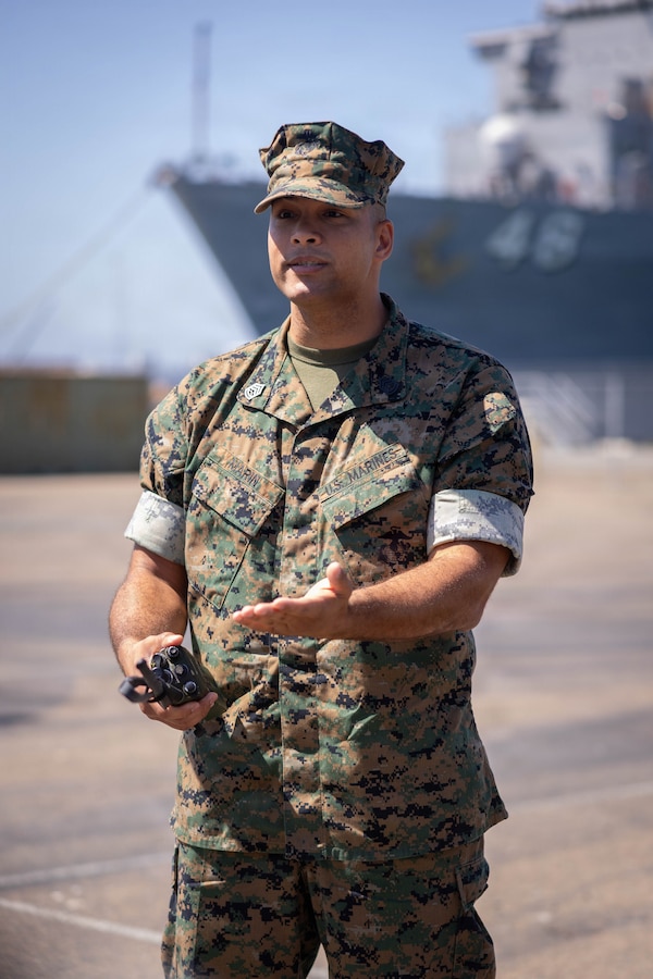 U.S. Marine Corps Gunnery Sgt. Marin, with 4th Light Armored Reconnaissance Battalion, 4th Marine Division, speaks to the company during a Reserve Mobilization Exercise, Naval Base San Diego, California, July 15, 2026. The week-long exercise validates the battalion’s ability to rapidly activate personnel and equipment, ensuring the unit can deliver ready forces in response to a national crisis. (U.S. Marine Corps photo by Lance Cpl. Claire Cheney)