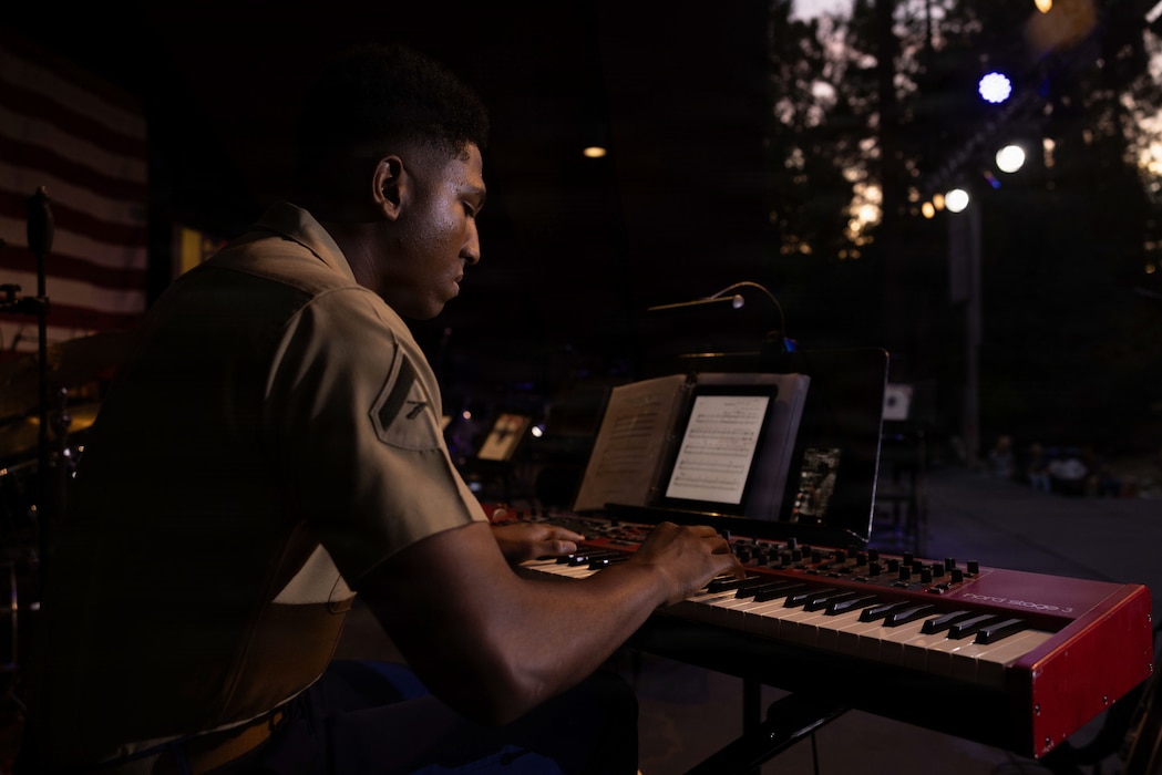 U.S. Marine Corps Lance Cpl. Jamarion Parks, a pianist with the 1st Marine Division Band, performs during a concert at the Butterfield Amphitheater, Idyllwild, California, Aug. 20, 2026. The band’s performance at Idyllwild contributes to the band’s mission of providing musical support to the surrounding community and as a means of maintaining community relations.  Parks is a native of Georgia. (U.S. Marine Corps photo by Cpl. Stella Tedesco)