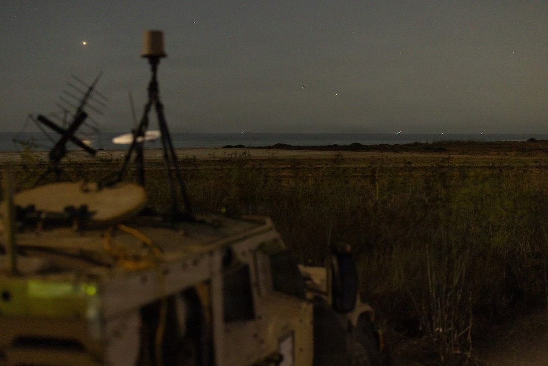 U.S. Marines assigned to 13th Marine Expeditionary Unit, detect and track simulated adversary forces during a sensing expeditionary advanced base training mission at Marine Corps Base Camp Pendleton, California, Aug. 22, 2026. The 13th MEU and the Makin Island Amphibious Ready Group are underway and conducting routine operations in the U.S. 3rd Fleet area of operations to enhance their combined Navy-Marine Corps readiness and lethality. (U.S. Marine Corps photo by Sgt. Martha Linares)