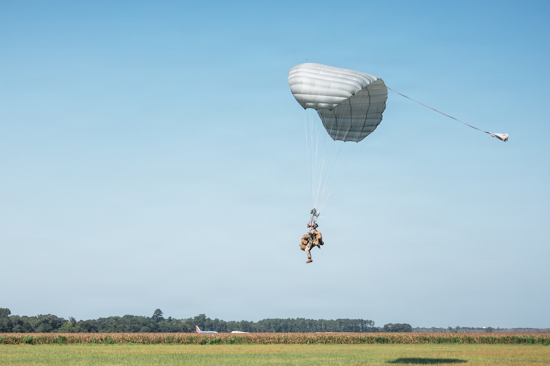 A U.S. Marine with Maritime Raid Force, 26th Marine Expeditionary Unit, parachutes into a drop zone during a military freefall sustainment at Raeford, North Carolina, Sept. 3, 2026. Military freefall sustainments are necessary to conduct parachute operations in support of the 26th MEU’s upcoming deployment. (U.S. Marine Corps photo by Cpl. Osmar VasquezHernandez)
