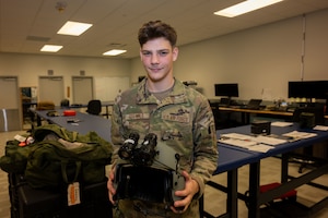 Guy poses for a photo.