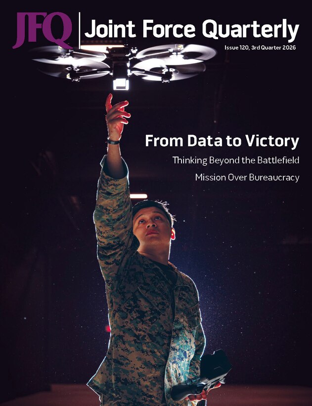 Cover of Joint Force Quarterly 120. Pictured is Lance Corporal Giancarlos Maldonado and a drone operator with Headquarters Company, 6th Marine Regiment, 2nd Marine Division, poses for a portrait with a Skydio X2D on Marine Corps Base Camp Lejeune, North Carolina, Nov. 21, 2025.