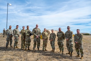 A group poses for a photo.