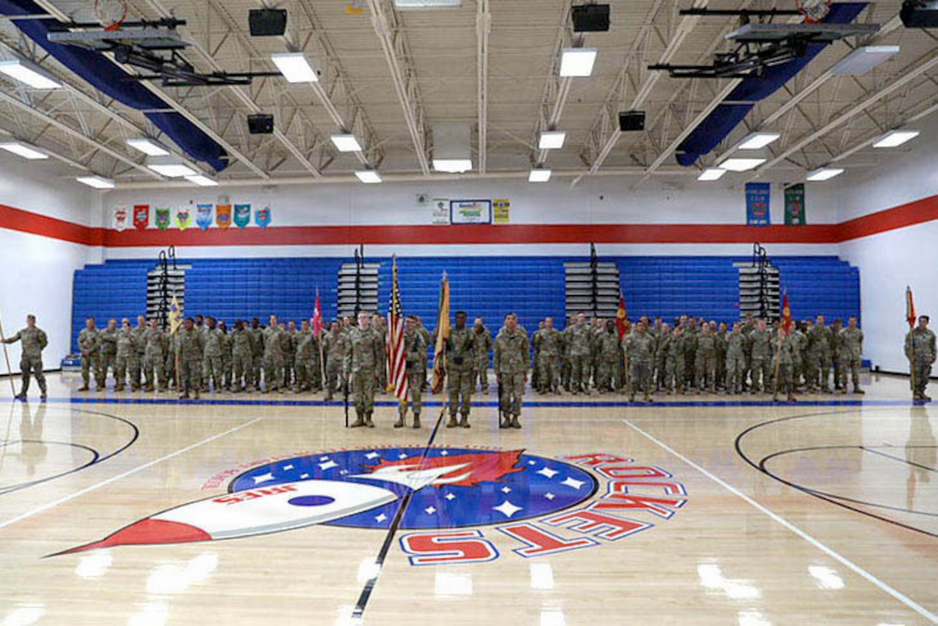 A color guard detail assigned to the 1792nd Combat Sustainment Support Battalion stands in front of formation with the national and unit colors during a change of command ceremony at Jody Richards Elementary School in Bowling Green, Kentucky, Aug. 23, 2026.