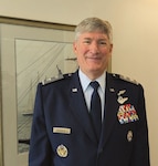 Col William T. Eliason, USAF (Ret.), PhD, editor in chief, NDU Press, faces the camera dressed in his Air Force uniform.