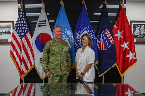 Ms. Jean Lee stands on the right, next to Deputy Commander of United Nations Command, Australian Army Lt. Gen. Scott Winter on the left as they pose for a photo in the Armistice Room at United Nations Command Headquarters on Camp Humphreys, South Korea, on September 4, 2026.