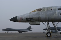 Three Boeing B-1B Lancer aircraft undergoing maintenance, repair and overhaul at the Oklahoma City Air Logistics Complex, are shown in foggy conditions during the morning of Feb. 14, 2018, Tinker Air Force Base, Oklahoma. OC-ALC is a subordinate unit of the Air Force Sustainment Center and is the complex responsible for bomber, tanker and jet engine maintenance. (U.S. Air Force photo/Greg L. Davis)