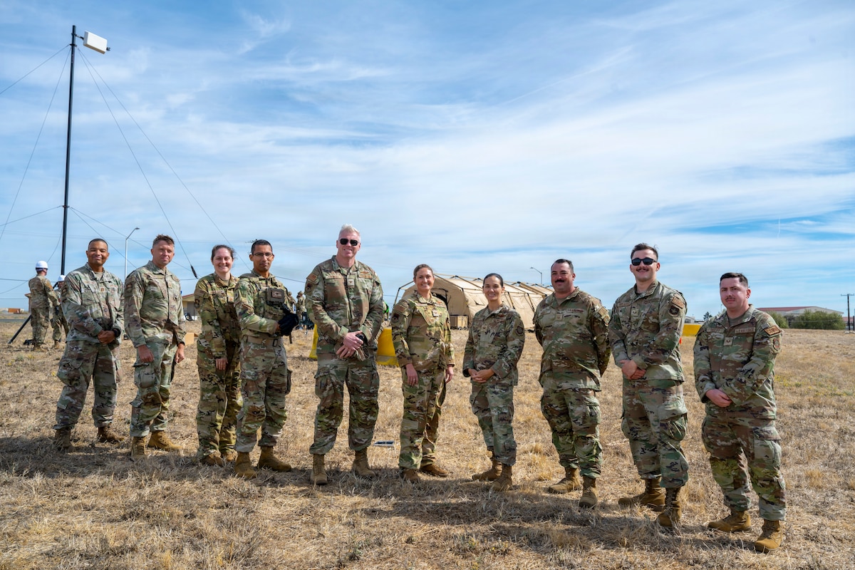 A group poses for a photo.