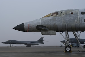 Three Boeing B-1B Lancer aircraft undergoing maintenance, repair and overhaul at the Oklahoma City Air Logistics Complex, are shown in foggy conditions during the morning of Feb. 14, 2018, Tinker Air Force Base, Oklahoma. OC-ALC is a subordinate unit of the Air Force Sustainment Center and is the complex responsible for bomber, tanker and jet engine maintenance. (U.S. Air Force photo/Greg L. Davis)