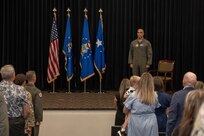 LANGLEY AIR FORCE BASE, Va -- U.S. Air Force Gen. Adrian Spain, commander of Air Combat Command, stands at attention during a Distinguished Flying Cross ceremony at Langley Air Force Base, Virginia, Aug. 31, 2026. The DFC is awarded to any officer or enlisted person of the Armed Forces of the United States for heroism or extraordinary achievement while participating in aerial flight. Both heroism and achievement must be entirely distinctive, involving operations that are not routine. (U.S. Air Force photo by Airman 1st Class Kaden Ciminnisi)