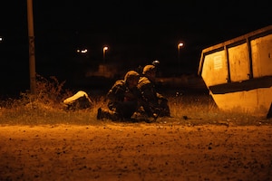 U.S. Soldiers assigned to 1st Battalion, 4th Infantry Regiment, take cover during exercise Saber Junction 26 at the Joint Multinational Readiness Center's Hohenfels Training Area, Germany, Sept. 5, 2026. The 7th Army Training Command provides a unique environment in Europe to develop leaders and formations prepared for large-scale combat operations, improving readiness. (U.S. Army photo by Pfc. William Justus)