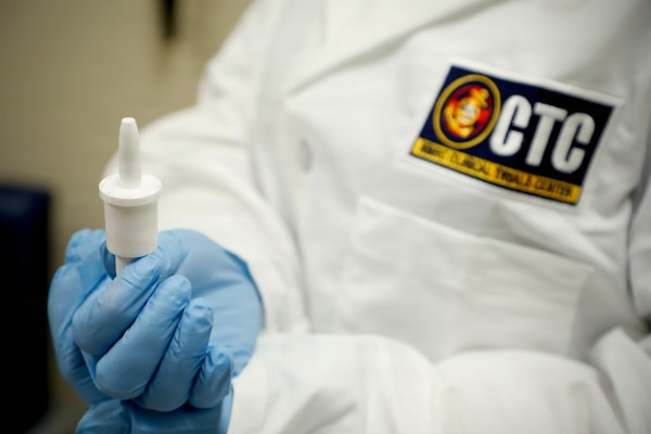 BETHESDA, Md. (Apr. 28, 2026) A researcher with Naval Medical Research Command’s (NMRC) Clinical Trials Center (CTC) holds a self-administered nasal spray called INNA-051, designed to prevent and reduce symptoms of viral respiratory infections like the common cold or flu. The CTC is preparing a study into the effectiveness of INNA-051, planned to begin in September. NMRC, headquarters of Navy Medicine Research & Development, is engaged in a broad spectrum of activity from basic science in the laboratory to field studies in austere and remote areas of the world to investigations in operational environments. In support of Navy, Marine Corps, and joint U.S. warfighter health, readiness and lethality, researchers study infectious diseases, biological warfare detection and defense, combat casualty care, environmental health concerns, aerospace and undersea medicine, operational mission support and epidemiology. (U.S. Navy photo by Sidney Hinds /Released)