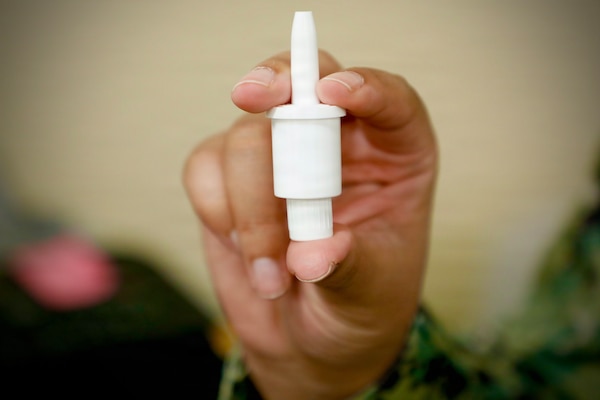 BETHESDA, Md. (Apr. 28, 2026) Pictured: a unit of a self-administered nasal spray called INNA-051, designed to prevent and reduce symptoms of viral respiratory infections like the common cold or flu. The Naval Medical Research Command’s (NMRC) Clinical Trials Center (CTC) is preparing a study into the effectiveness of INNA-051, planned to begin in September. NMRC, headquarters of Navy Medicine Research & Development, is engaged in a broad spectrum of activity from basic science in the laboratory to field studies in austere and remote areas of the world to investigations in operational environments. In support of Navy, Marine Corps, and joint U.S. warfighter health, readiness and lethality, researchers study infectious diseases, biological warfare detection and defense, combat casualty care, environmental health concerns, aerospace and undersea medicine, operational mission support and epidemiology. (U.S. Navy photo by Sidney Hinds /Released)