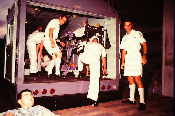 A former hospital corpsman and retired warrant officer has donated a collection of historical photographs and memorabilia to U.S. Navy Medicine Readiness and Training Command Guam and U.S. Naval Hospital Guam, preserving a vital piece of Navy Medicine’s medical legacy supporting military operations in the Pacific during the Vietnam War. The photographs capture the raw reality of hospital operations between 1968 and 1969 at the former U.S. Naval Hospital Guam built in 1954 in Agana Heights, Guam. They show medical evacuation, patient care, and hospital staff at work. (Courtesy photo)