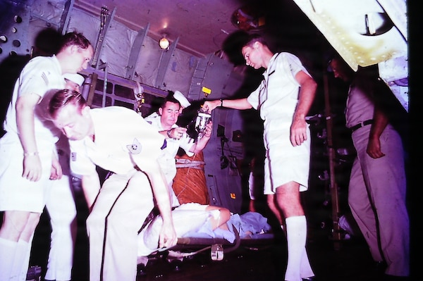 A former hospital corpsman and retired warrant officer has donated a collection of historical photographs and memorabilia to U.S. Navy Medicine Readiness and Training Command Guam and U.S. Naval Hospital Guam, preserving a vital piece of Navy Medicine’s medical legacy supporting military operations in the Pacific during the Vietnam War. The photographs capture the raw reality of hospital operations between 1968 and 1969 at the former U.S. Naval Hospital Guam built in 1954 in Agana Heights, Guam. They show medical evacuation, patient care, and hospital staff at work. (Courtesy photo)