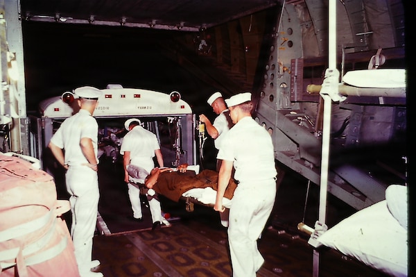 A former hospital corpsman and retired warrant officer has donated a collection of historical photographs and memorabilia to U.S. Navy Medicine Readiness and Training Command Guam and U.S. Naval Hospital Guam, preserving a vital piece of Navy Medicine’s medical legacy supporting military operations in the Pacific during the Vietnam War. The photographs capture the raw reality of hospital operations between 1968 and 1969 at the former U.S. Naval Hospital Guam built in 1954 in Agana Heights, Guam. They show medical evacuation, patient care, and hospital staff at work. (Courtesy photo)