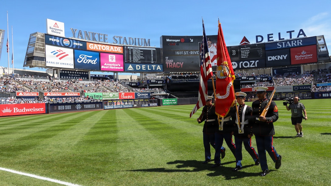 U.S. Marines with 1st Marine Corps District present the colors during the playing of the National Anthem, Aug. 29, 2026, at Yankee Stadium in New York, New York. The color guard is responsible for rendering appropriate military honors. This traditional formation gives dignity and respect to the Nation and those who have served. (U.S. Marine Corps photo by Sgt. Marcel Gorka)