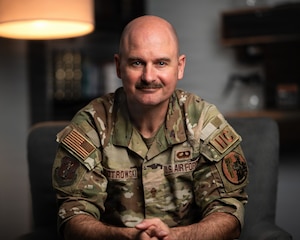 A photo of U.S. Air Force Capt. Nathan Piotrowski, a chaplain at the 158th Fighter Wing, sitting in his office in South Burlington, Vermont.