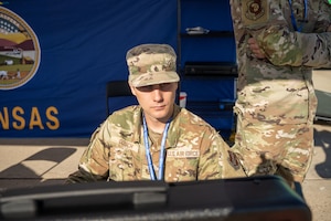 Tech. Sgt. Dalton Gosch, 184th Wing Point Defense Battle Lab (PDBL), monitors equipment during Technology Readiness Experimentation (T-REX) in Grand Forks, North Dakota, Aug. 27, 2026. T-REX provides an operationally relevant environment to evaluate emerging technologies, identify capability gaps and gather feedback from warfighters before systems are fielded. (U.S. Air National Guard photo by Staff Sgt. John Macera)