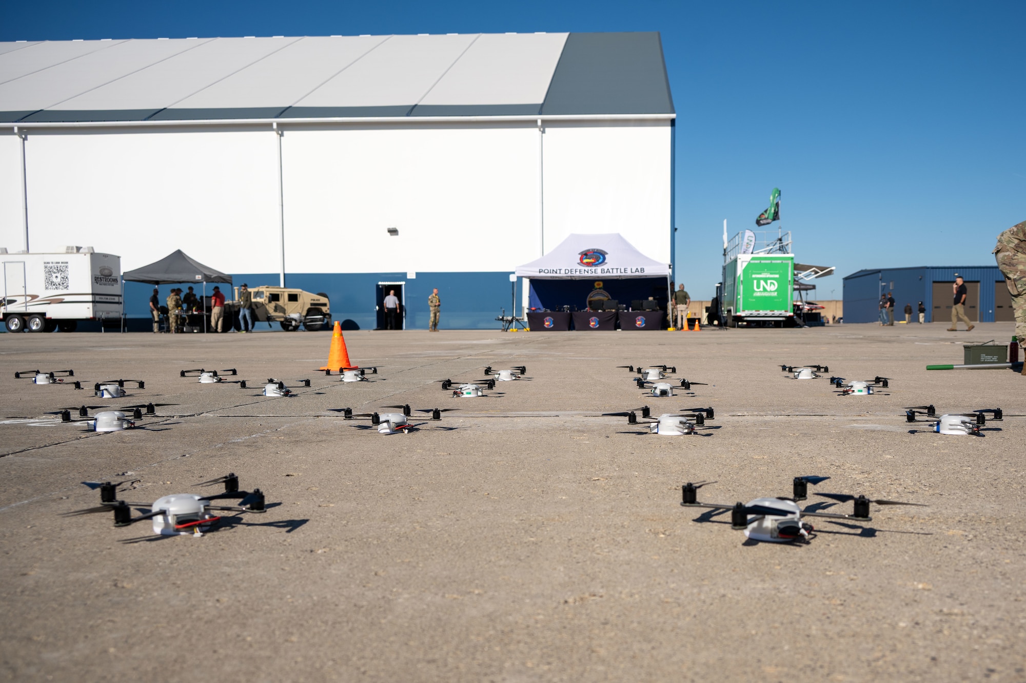 Unmanned aircraft systems are staged for testing during Technology Readiness Experimentation (T-REX) in Grand Forks, North Dakota, Aug. 27, 2026. T-REX provides an operationally relevant environment to evaluate emerging technologies, identify capability gaps and gather feedback from warfighters before systems are fielded. (U.S. Air National Guard photo by SSgt. John Macera)