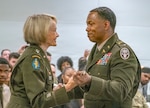 The passing of the ceremonial saber from Lt. Gen. Mary Izaguirre, the U.S. Army Surgeon General and Commanding General U.S. Army Medical Command to Chief Warrant Officer 5 Terrence Ward, incoming command chief warrant officer August 28, 2026 during the Change of Responsibility ceremony in Falls Church, Virginia.