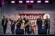 The U.S. Army Europe and Africa Band’s Rhine River Ramblers wave to an applauding crowd during a joint concert with the Moldovan Presidential Band in Alunelul Park, Chisinau, Republic of Moldova, Sept. 5, 2026. The performance marked Moldova’s 35th National Armed Forces Day and highlighted more than three decades of U.S.–Moldova defense partnership built on mutual respect and shared national pride. (Photo courtesy of U.S. Embassy Chisinau)