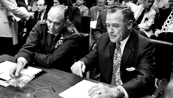 Sitting side by side, then-Air Force Chief of Staff Gen. John Ryan and recently fired Maj. Gen. John Lavelle testified before a House Armed Services subcommittee in 1972, as Congress investigated whether Lavelle acted within his authority or not in directing bombings in North Vietnam. (Photo courtesy of Air and Space Forces Magazine)