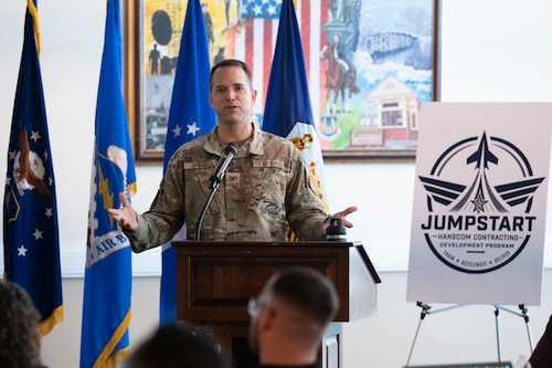 Image of man speaking at the podium