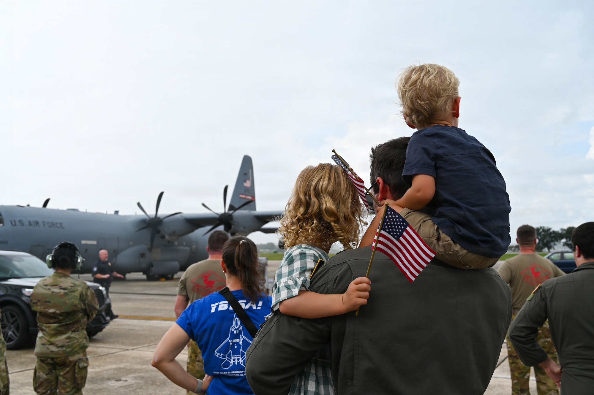 Families hug service members