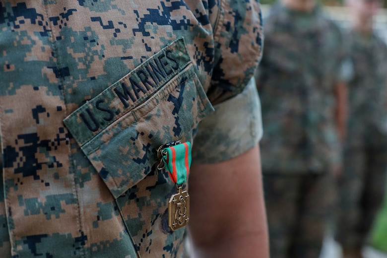 U.S. Marine Corps Cpl. Jeremiah Chancey, a White House sentry assigned to Guard Company, Marine Barracks Washington, stands at attention after receiving a Navy and Marine Corps Achievement Medal during an awards ceremony at Marine Barracks Washington, D.C., Sept 9, 2026. Col. Jason Copeland, commanding officer, Marine Barracks Washington, presented Navy and Marine Corps Achievement Medals to five Guard Company Marines for their professionalism, vigilance and resilience while serving as White House sentries during Operation Midnight Hammer and Operation Absolute Resolve from June 2025 to March 2026. Whether safeguarding the “Oldest Post of the Corps” or standing watch in direct support of the President, Barracks Marines demonstrate the discipline and resilience required to respond when and where they are needed. (U.S. Marine Corps photo by Capt. Lauri Schleicher)