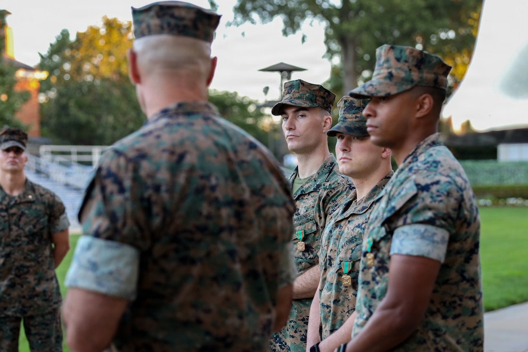 Col. Jason Copeland, commanding officer, Marine Barracks Washington, speaks to White House sentries assigned to Guard Company Marine Barracks Washington, following an awards ceremony at Marine Barracks Washington, D.C., Sept 9, 2026. Copeland presented five Guard Company Marines with Navy and Marine Corps Achievement Medals for their professionalism, vigilance and resilience while serving as White House sentries during Operation Midnight Hammer and Operation Absolute Resolve from June 2025 to March 2026. Whether safeguarding the “Oldest Post of the Corps” or standing watch in direct support of the President, Barracks Marines demonstrate the discipline and resilience required to respond when and where they are needed. (U.S. Marine Corps photo by Capt. Lauri Schleicher)