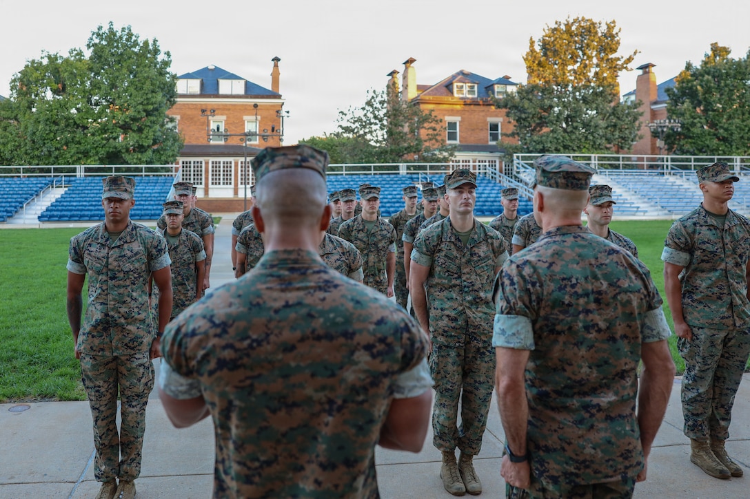 U.S. Marines who serve as White House sentries with Guard Company, Marine Barracks Washington, stand at attention during an awards ceremony at Marine Barracks Washington, D.C., Sept 9, 2026. Col. Jason Copeland, commanding officer, Marine Barracks Washington, presented Navy and Marine Corps Achievement Medals to five Guard Company Marines for their professionalism, vigilance and resilience while serving as White House sentries during Operation Midnight Hammer and Operation Absolute Resolve from June 2025 to March 2026. Whether safeguarding the “Oldest Post of the Corps” or standing watch in direct support of the President, Barracks Marines demonstrate the discipline and resilience required to respond when and where they are needed. (U.S. Marine Corps photo by Capt. Lauri Schleicher)