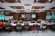 Multinational service members receive a situational brief during a Humanitarian Assistance Disaster Relief table top exercise held at the Indonesian Armed Forces Staff and Command School during Super Garuda Shield 26 in Bandung, Indonesia, Sep. 1, 2026. Super Garuda Shield is an annual exercise between the Indonesian National Armed Forces and U.S. military designed to strengthen bilateral interoperability, capabilities and cooperation.  (U.S. Air National Guard photo by Tech. Sgt. Orlando Corpuz)