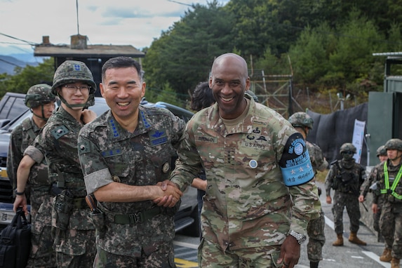 U.S. Army Gen. Xavier T. Brunson and ROK Joint Chiefs of Staff Chairman Gen. Jin Yong-sung shake hands during a visit to a guard post along the eastern front of the Demilitarized Zone on Sept. 9, 2026, where they reviewed the operational situation and frontline readiness.