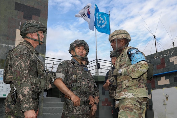 U.S. Army Gen. Xavier T. Brunson and ROK Joint Chiefs of Staff Chairman Gen. Jin Yong-sung looking around the site under flags of Republic of Korea and United Nations Command at guard post along the eastern front of the Demilitarized Zone on Sept. 9, 2026, to review the operational situation and inspect frontline readiness.
