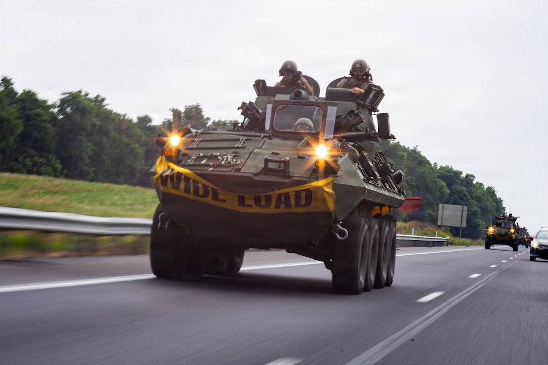 U.S. Marine Corps light armored vehicles assigned to the 4th Light Armored Reconnaissance Battalion, 4th Marine Division, Marine Forces Reserve, conduct a convoy during a Reserve Mobilization Exercise, Maryland, June 29, 2026. The week-long exercise validates the battalion's ability to rapidly activate personnel and equipment, ensuring the unit can deliver ready forces in response to a national crisis.